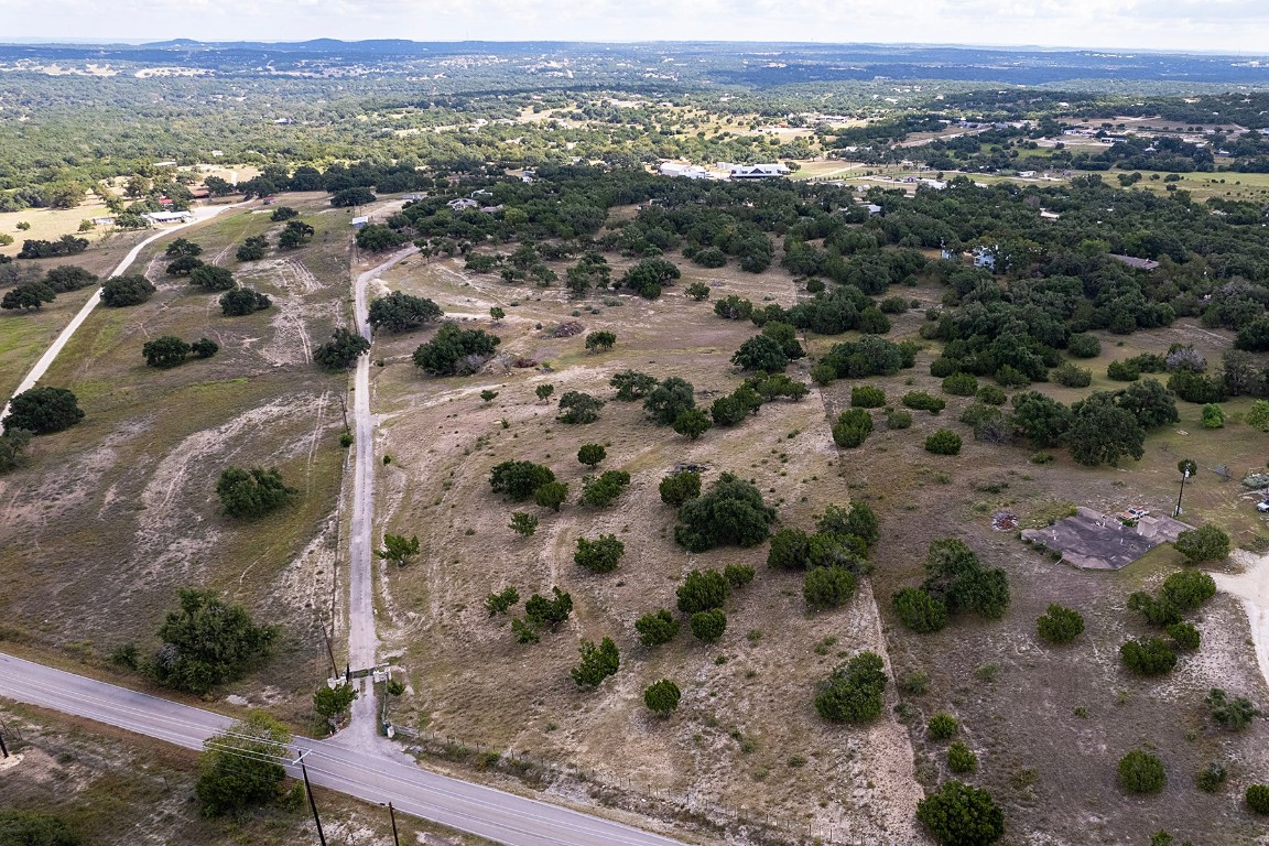 4525 Bell Springs Road Dripping Springs, TX 78620 - Photo 34 of 38 an aerial view of mountain with yard