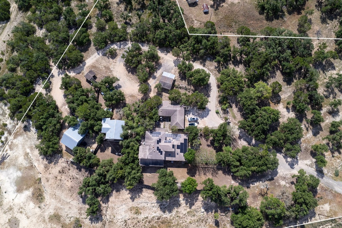 4525 Bell Springs Road Dripping Springs, TX 78620 - Photo 4 of 38 an aerial view of a house with a yard