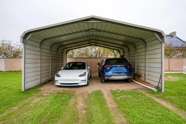 a car parked in front of a house