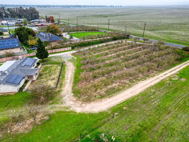 a view of a field with an outdoor space