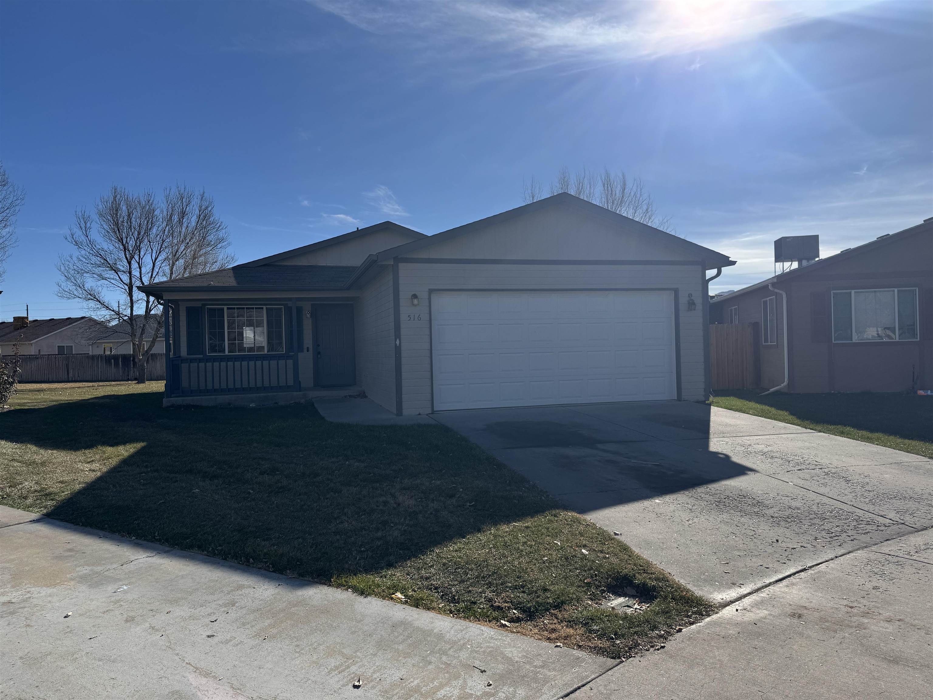 516 Vermont Lane Fruita, CO 81521 - Photo 1 of 13 a view of a house with a yard