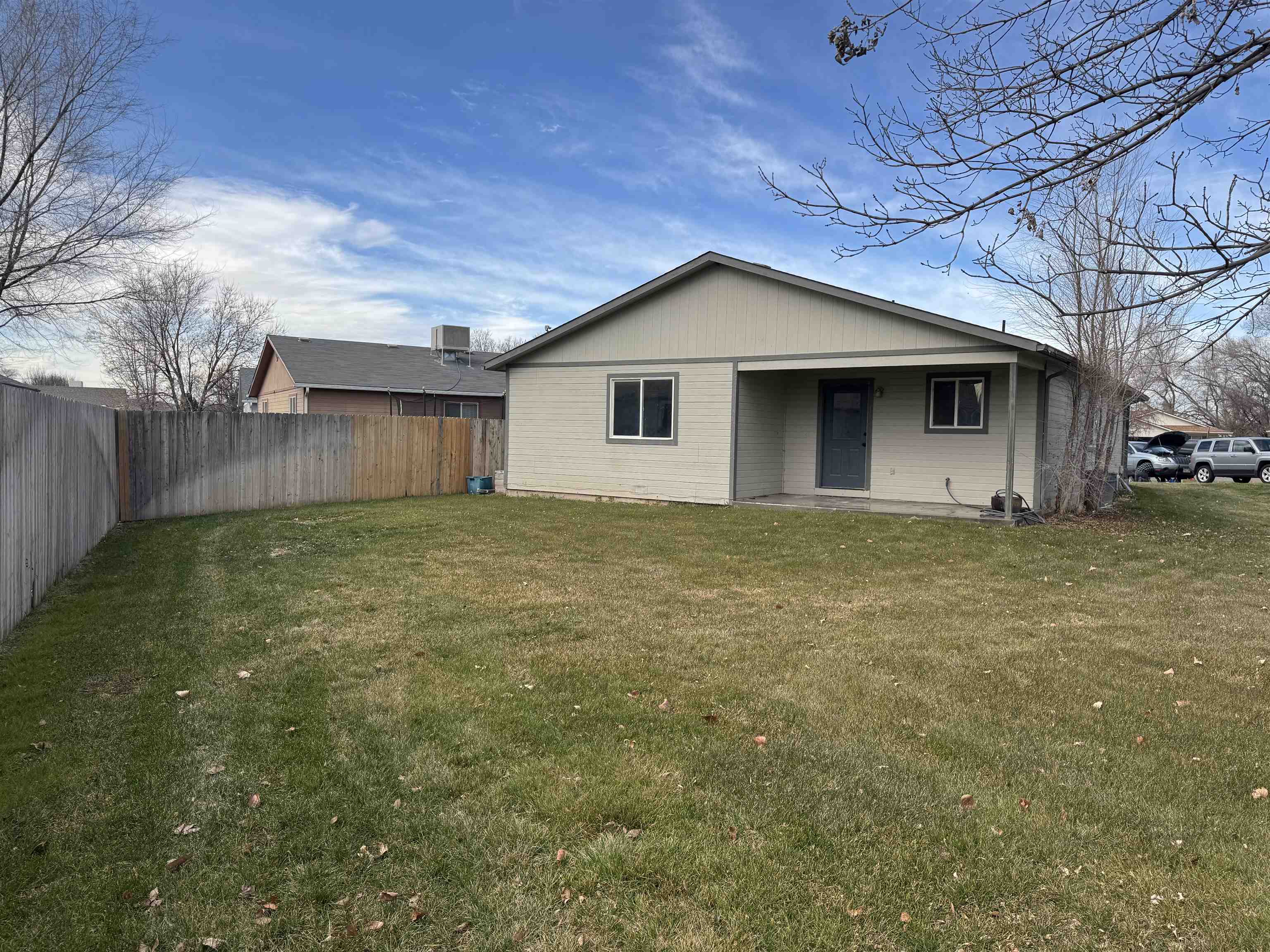 516 Vermont Lane Fruita, CO 81521 - Photo 13 of 13 a view of a house with a yard
