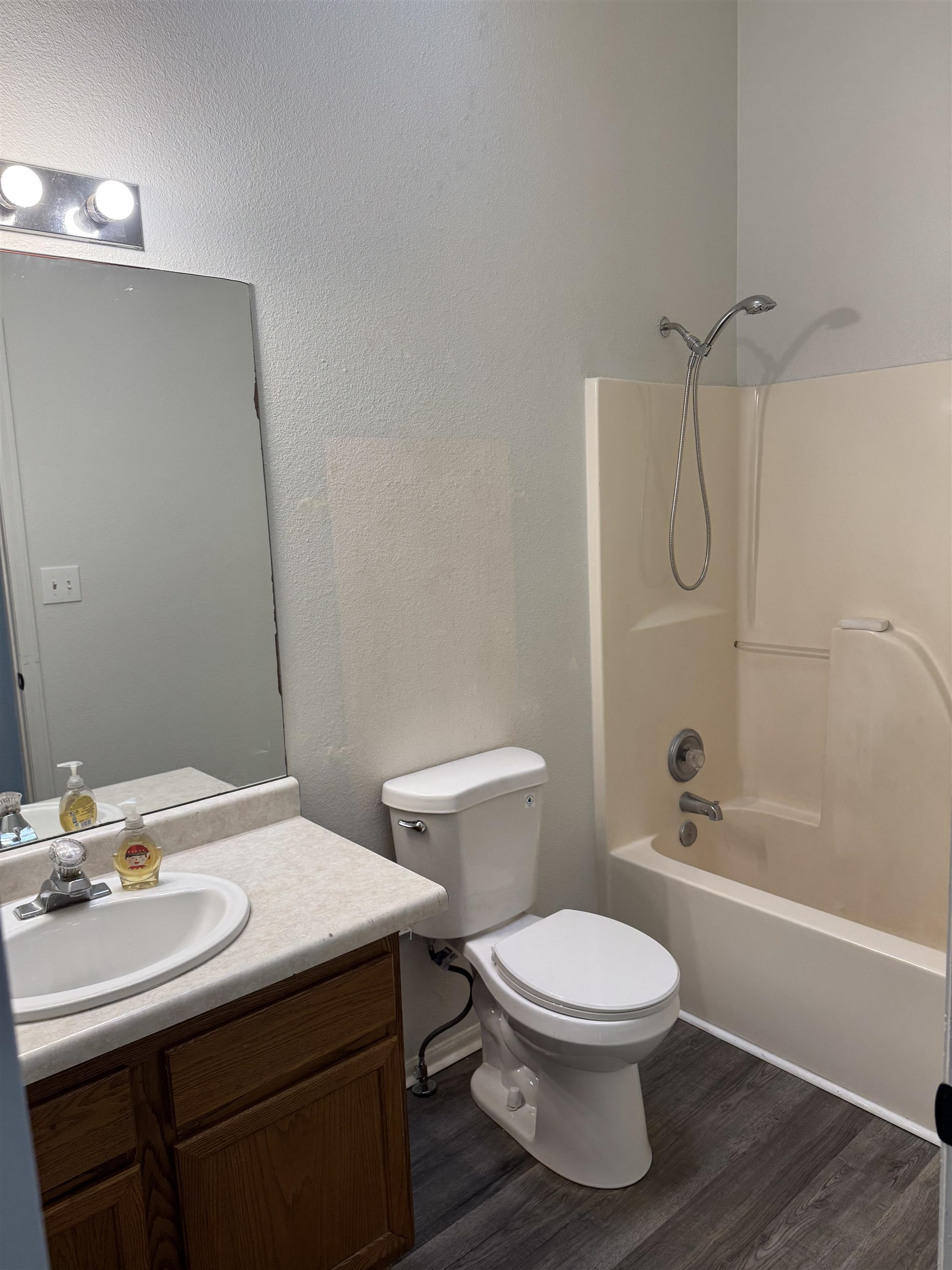516 Vermont Lane Fruita, CO 81521 - Photo 7 of 13 a bathroom with a sink a toilet and shower