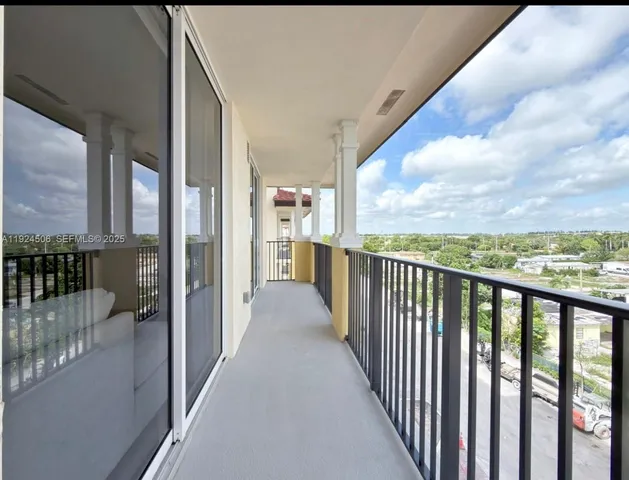 a view of a balcony with city view