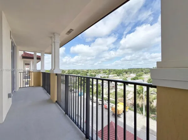 a view of a balcony with city view