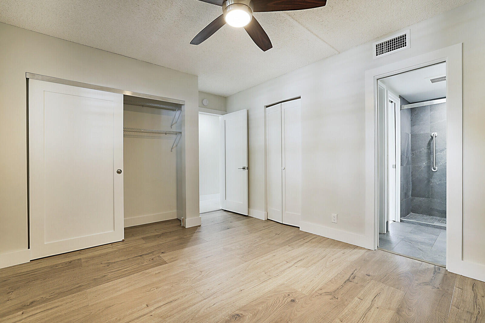 1439 South Ocean Boulevard, Unit 208 Lauderdale-by-the-Sea, FL 33062 - Photo 17 of 27 a view of empty room with wooden floor