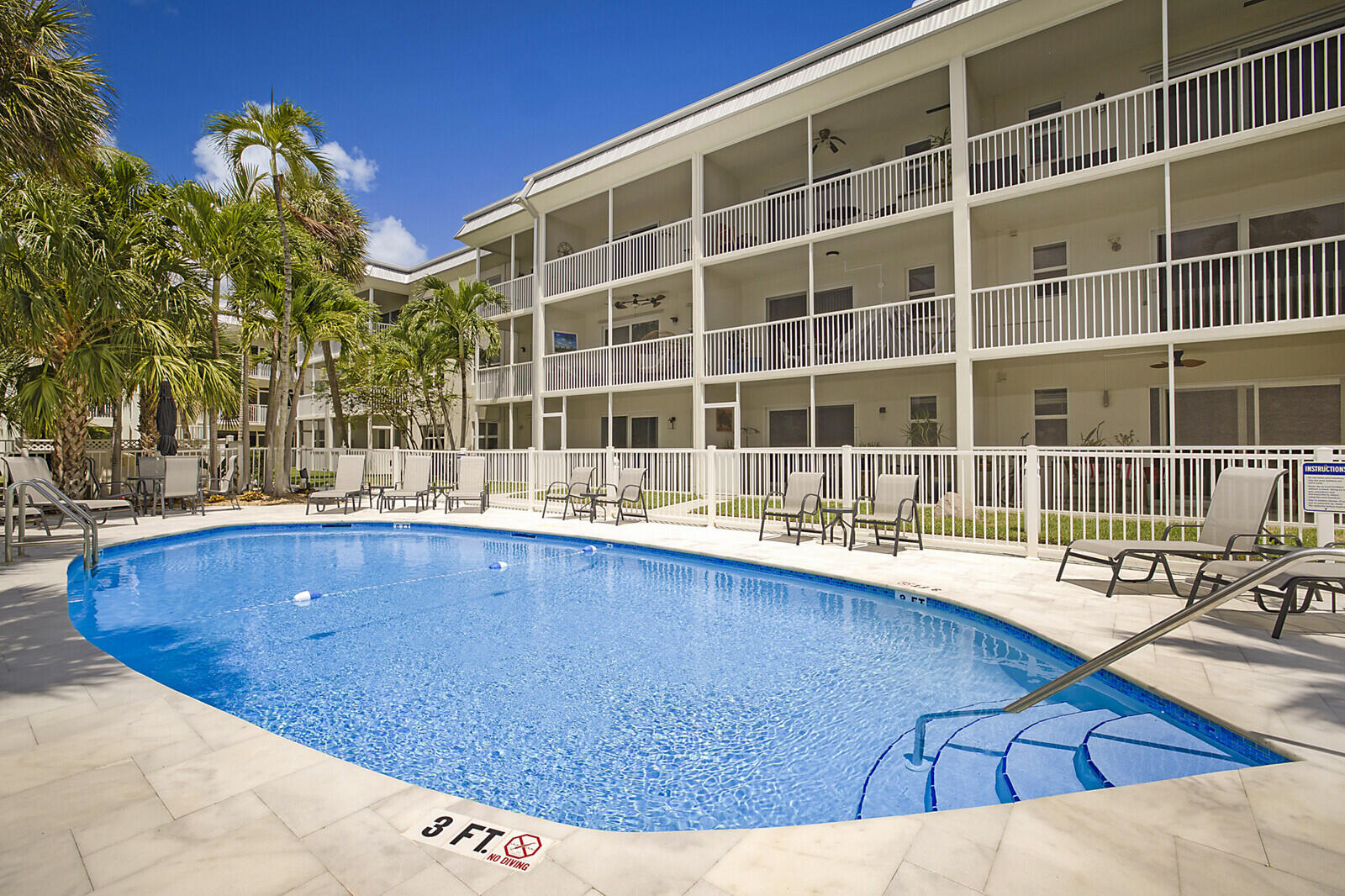 1439 South Ocean Boulevard, Unit 208 Lauderdale-by-the-Sea, FL 33062 - Photo 27 of 27 a view of a swimming pool with outdoor seating