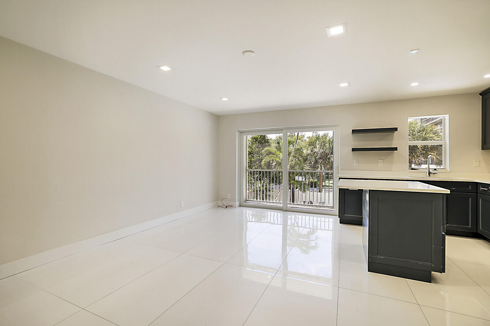 1439 South Ocean Boulevard, Unit 208 Lauderdale-by-the-Sea, FL 33062 - Photo 6 of 27 a view of an empty room with a window