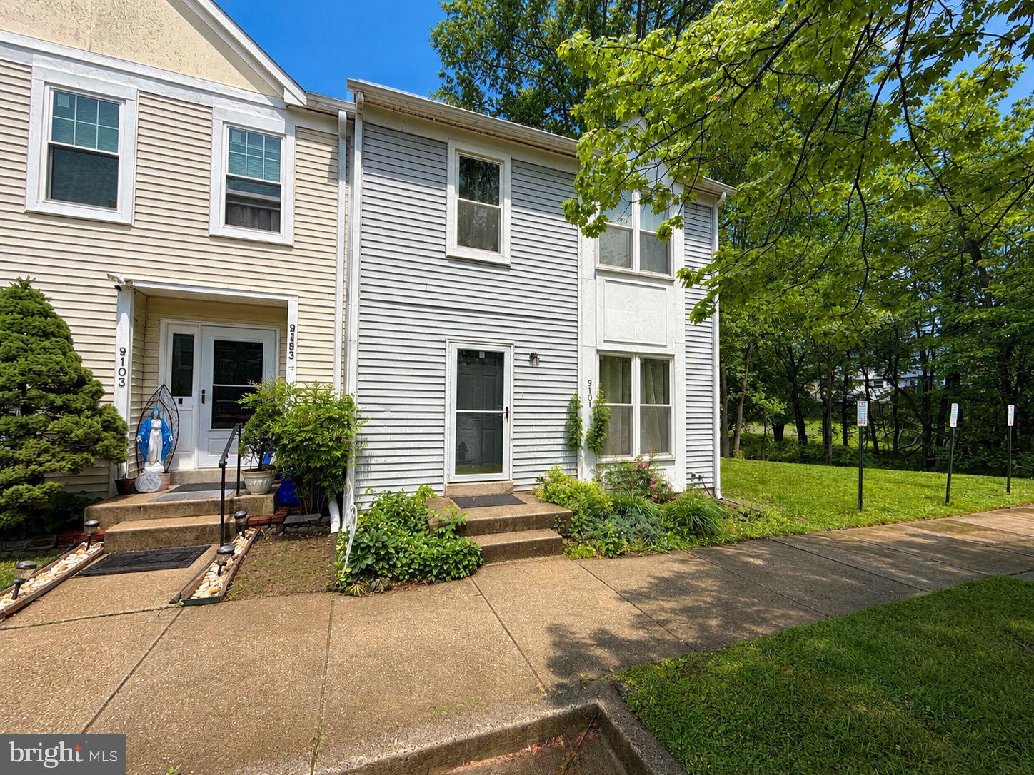 9101 Trams Way Gaithersburg, MD 20879 - Photo 1 of 1 a front view of house with yard and green space