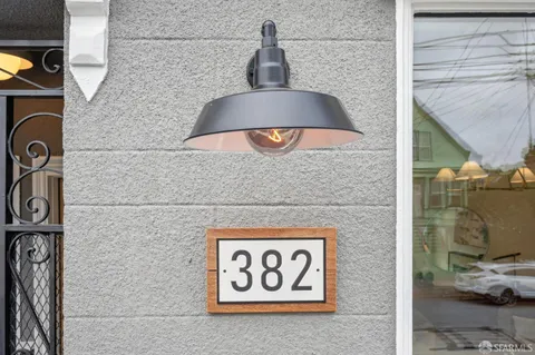 a kitchen with stainless steel appliances granite countertop a stove a sink and a granite counter tops