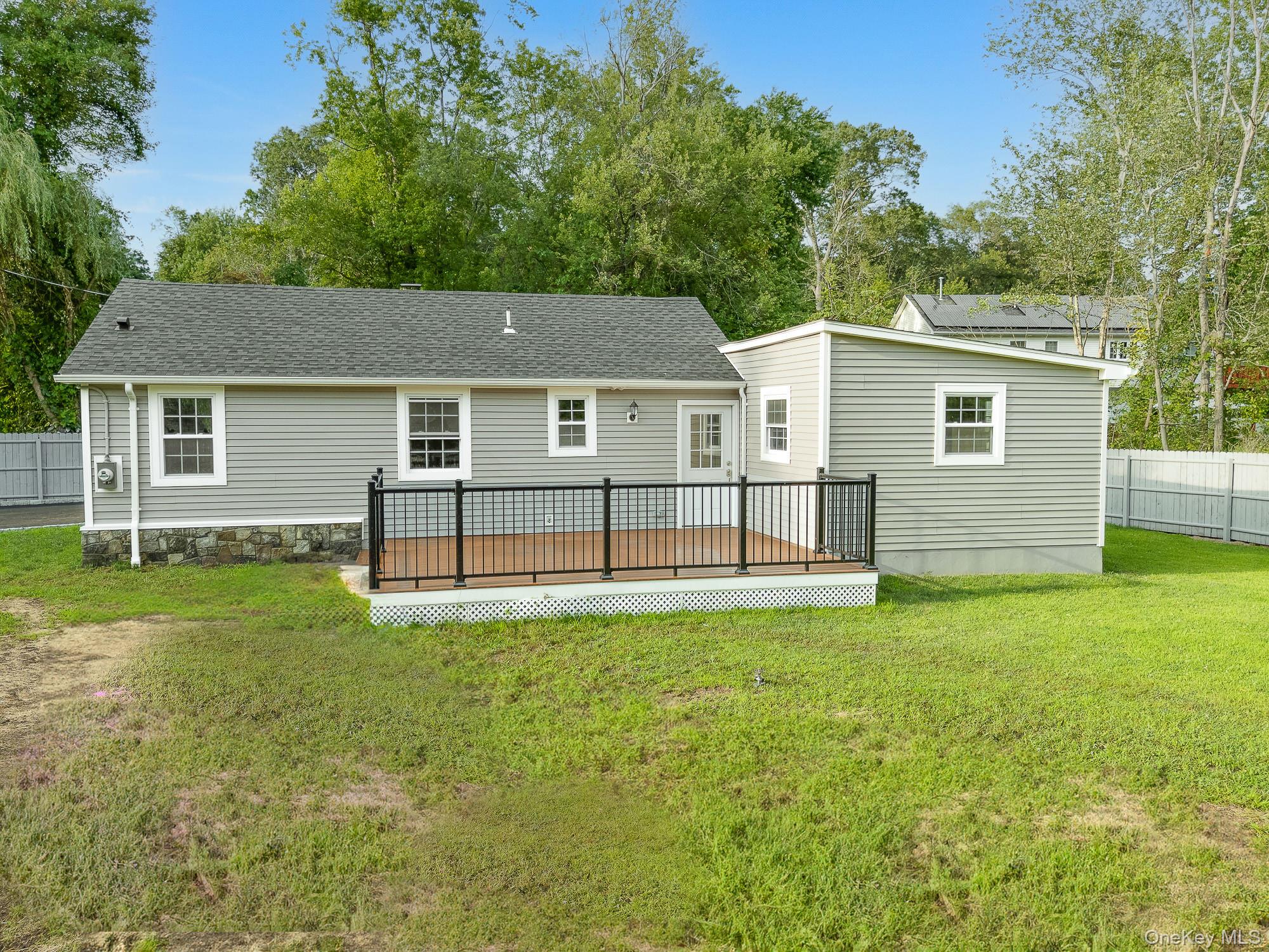 3167 Lincoln Drive Mohegan Lake, NY 10547 - Photo 1 of 34 front view of a house with a yard
