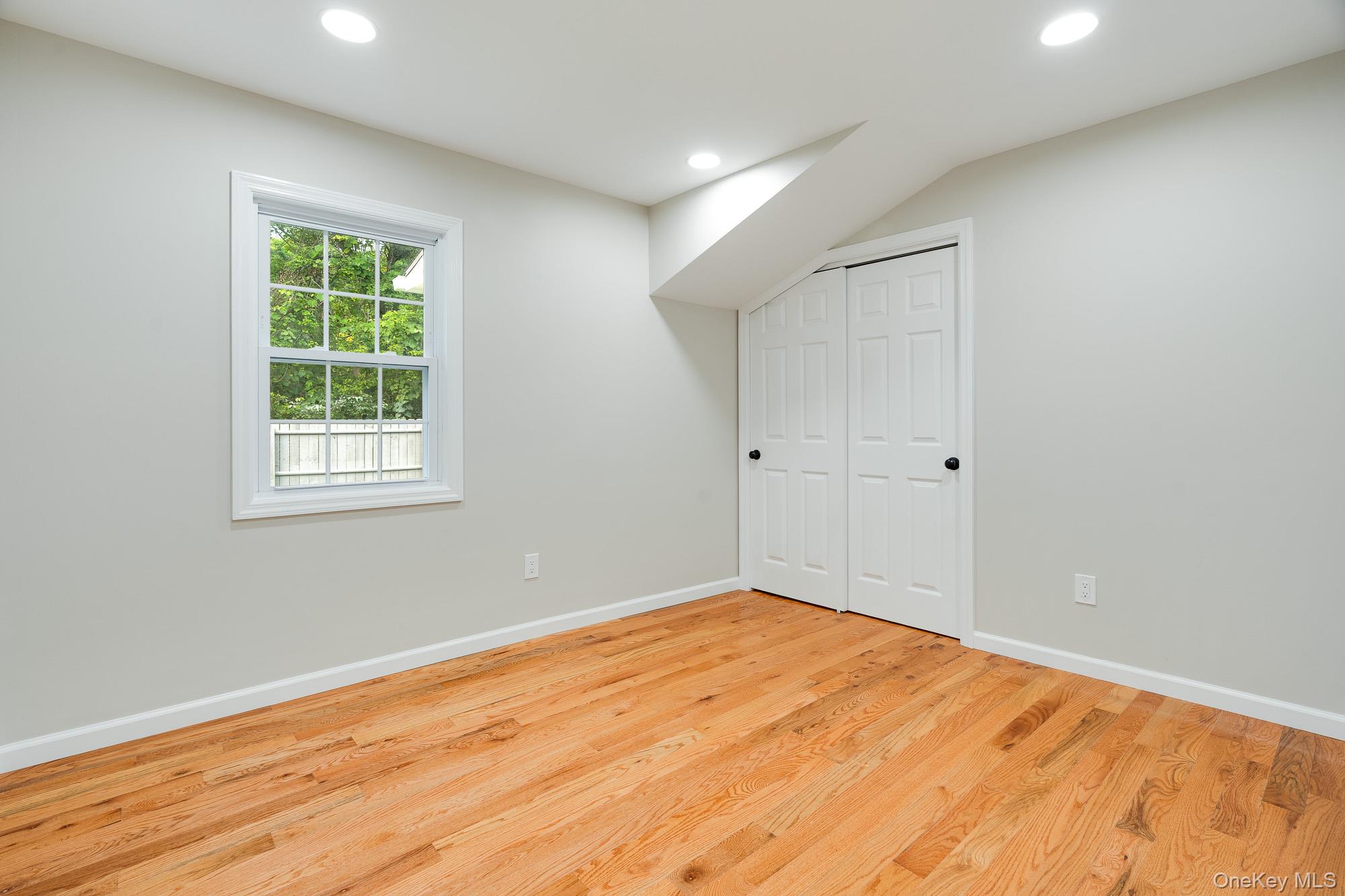 3167 Lincoln Drive Mohegan Lake, NY 10547 - Photo 18 of 34 a view of empty room with wooden floor