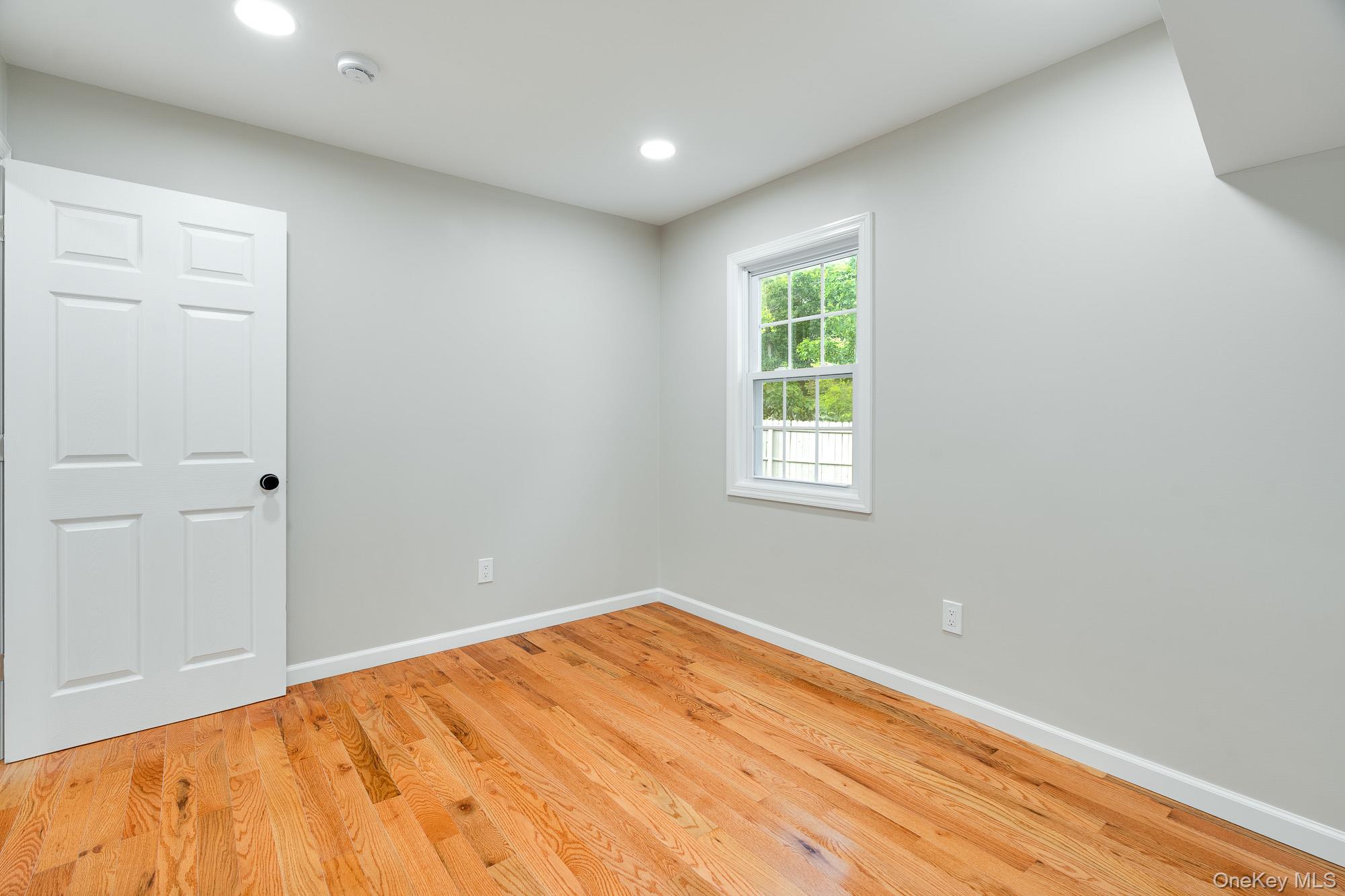 3167 Lincoln Drive Mohegan Lake, NY 10547 - Photo 19 of 34 a view of empty room with wooden floor