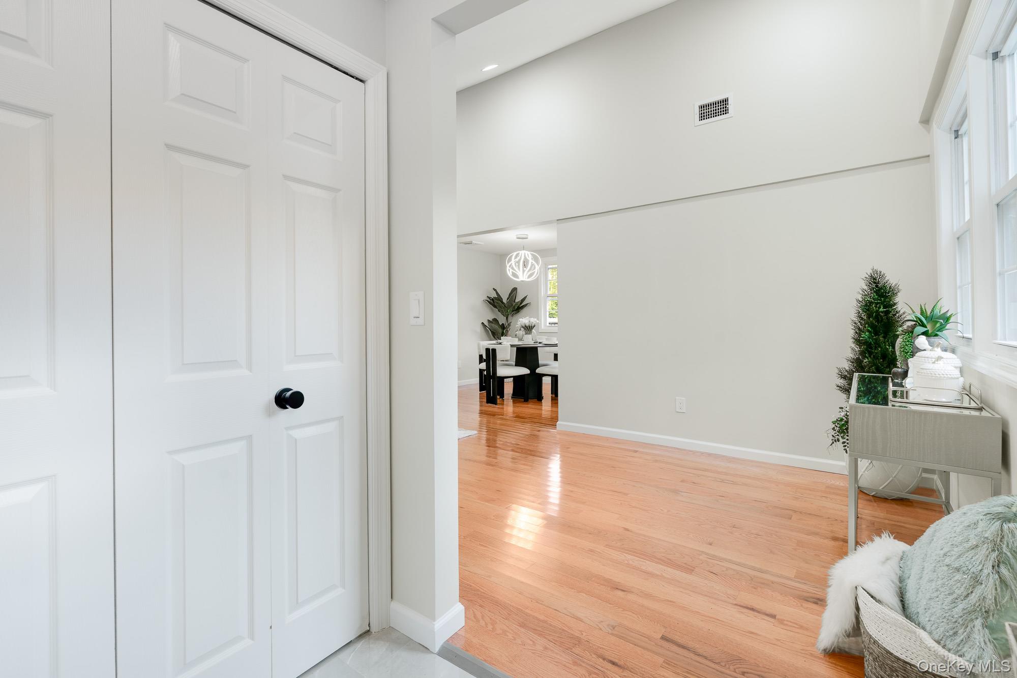 3167 Lincoln Drive Mohegan Lake, NY 10547 - Photo 4 of 34 a view of livingroom with hardwood floor and hallway