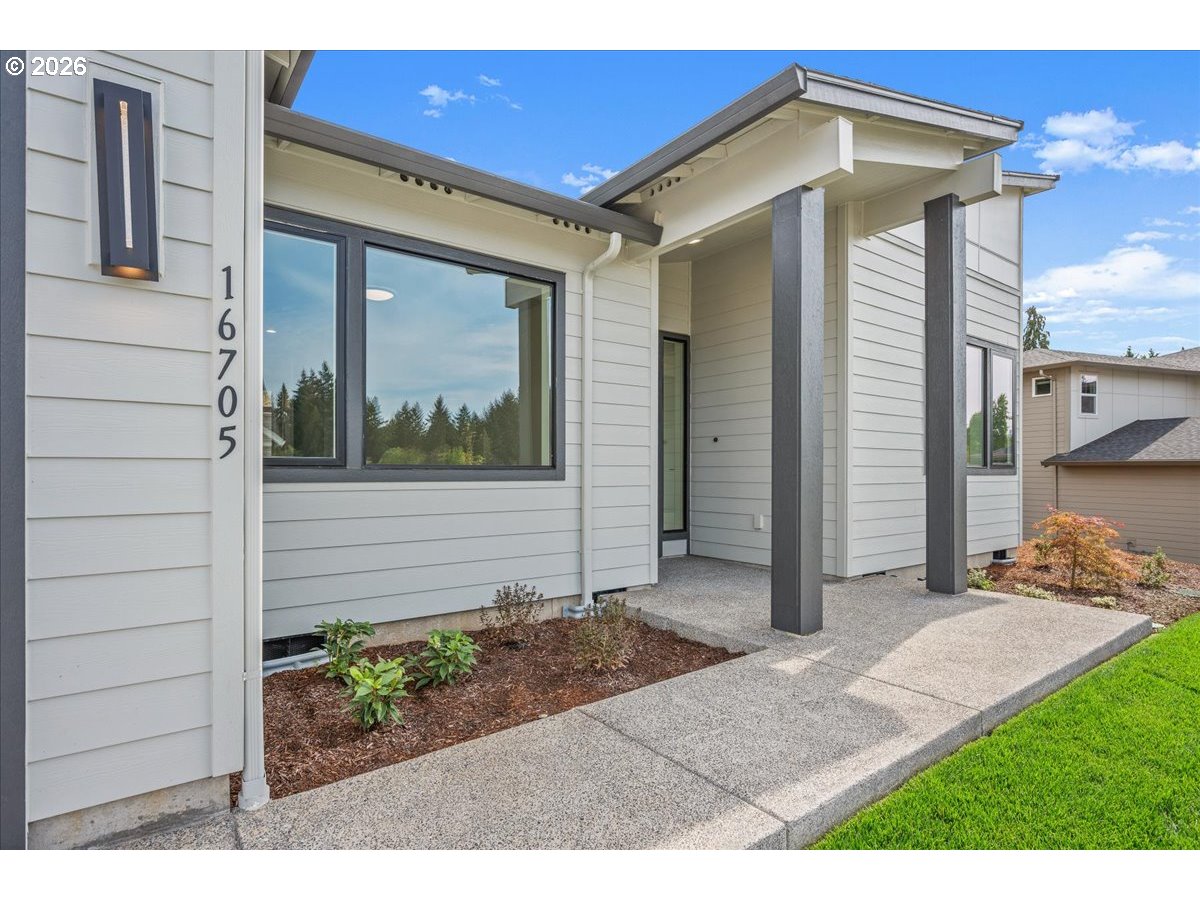 16705 Northeast 38th Avenue Vancouver, WA 98686 - Photo 2 of 45 a view of a house with a yard