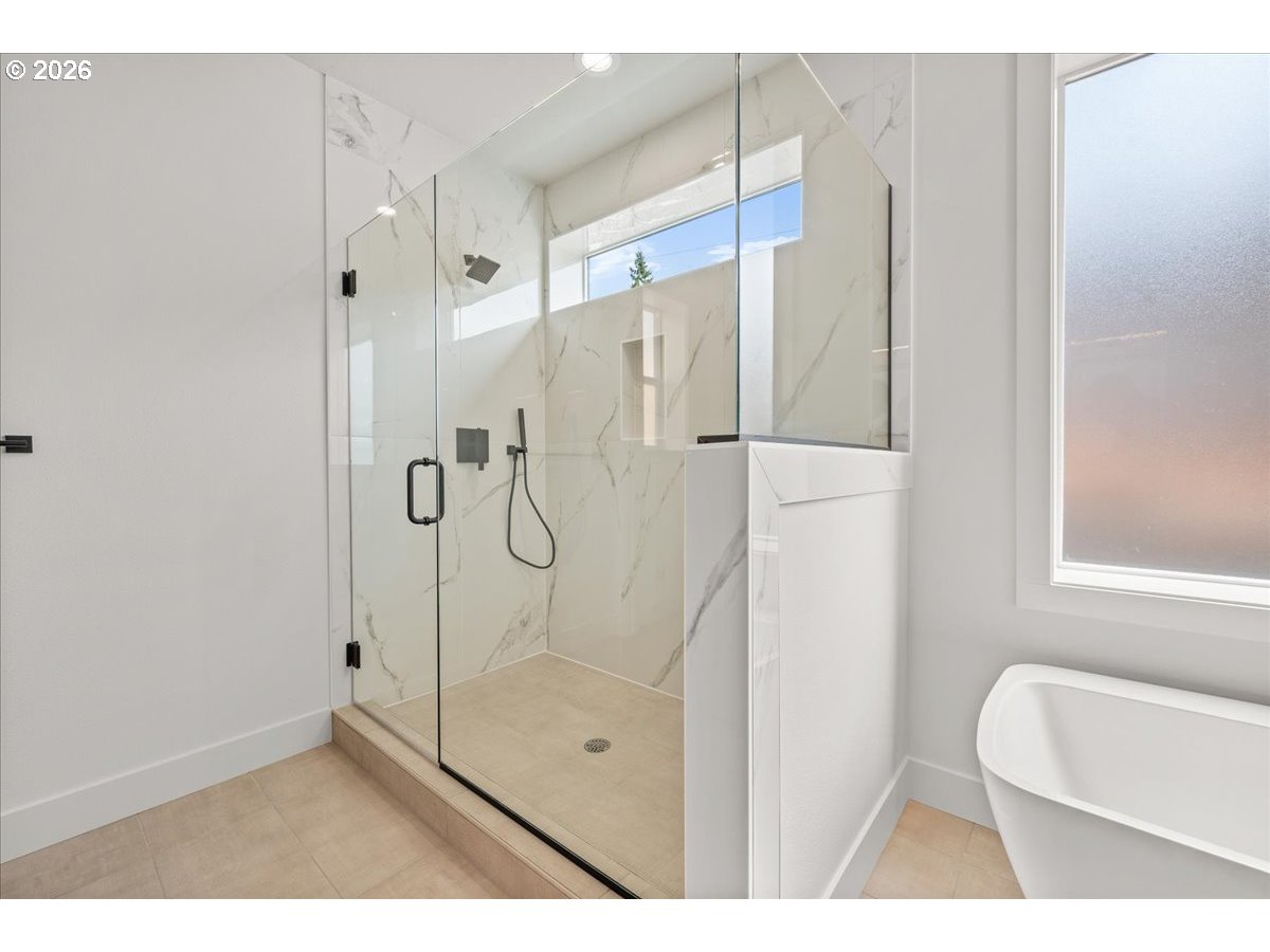 16705 Northeast 38th Avenue Vancouver, WA 98686 - Photo 25 of 45 a bathroom with a shower and a toilet