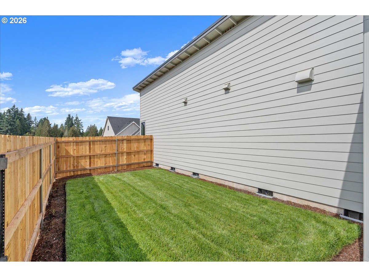 16705 Northeast 38th Avenue Vancouver, WA 98686 - Photo 33 of 45 a view of backyard with wooden fence