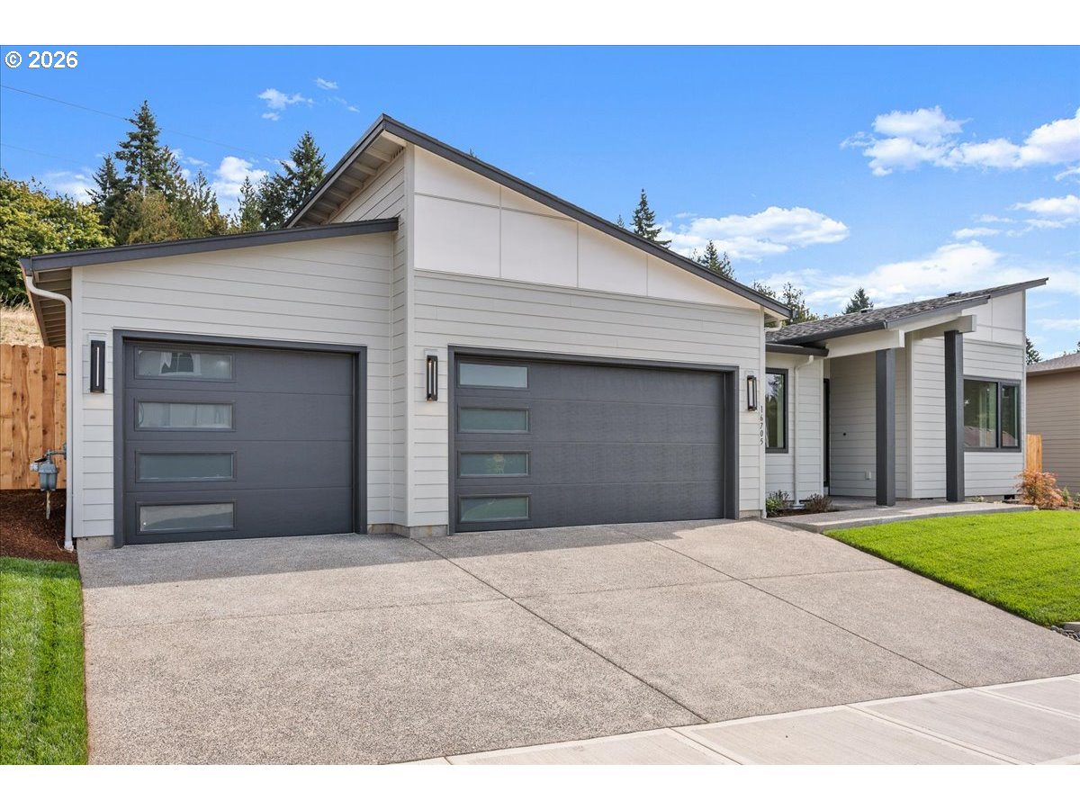 16705 Northeast 38th Avenue Vancouver, WA 98686 - Photo 38 of 45 a front view of a house with a garage