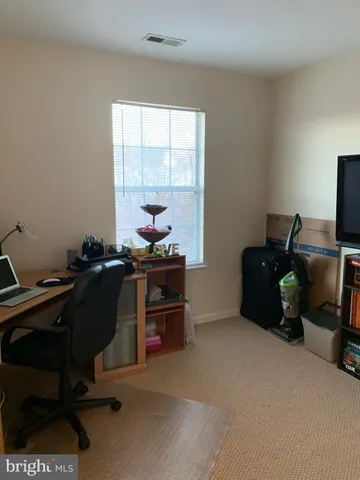 a room with furniture and a window