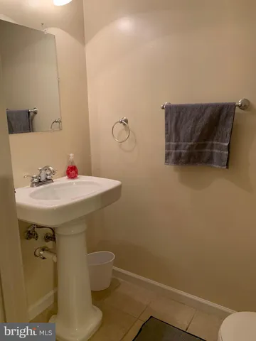 a bathroom with a sink and a toilet