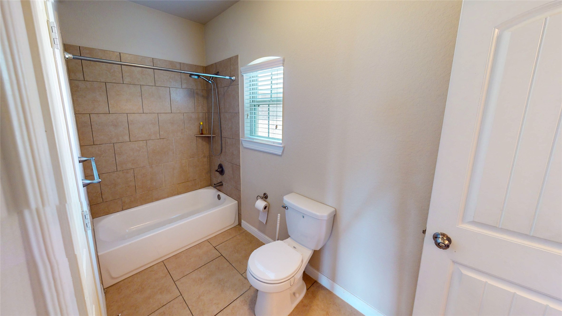 14535 Julie Meadows Lane Humble, TX 77396 - Photo 26 of 35 a bathroom with a toilet and a shower