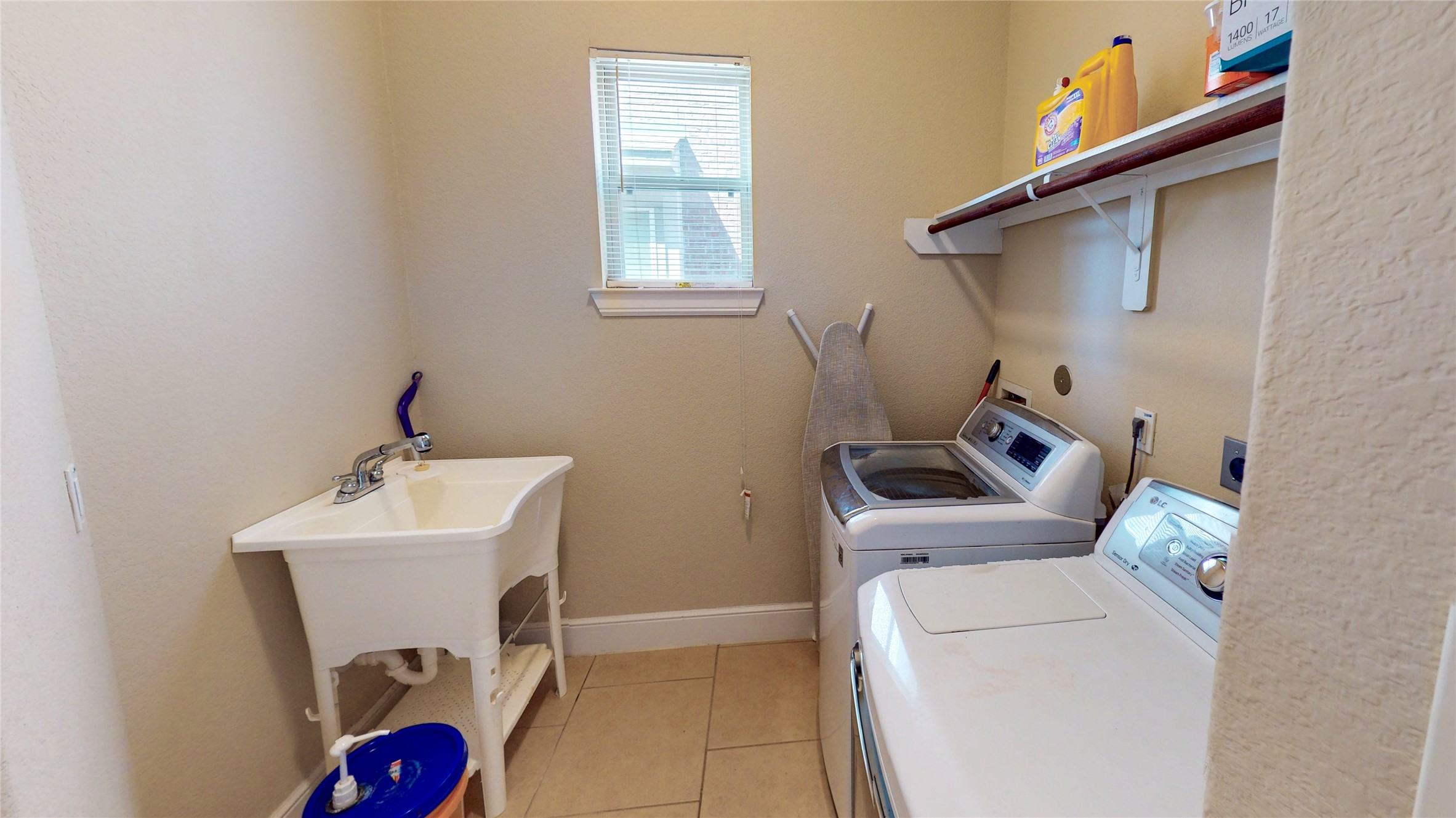 14535 Julie Meadows Lane Humble, TX 77396 - Photo 29 of 35 a utility room with dryer and washer