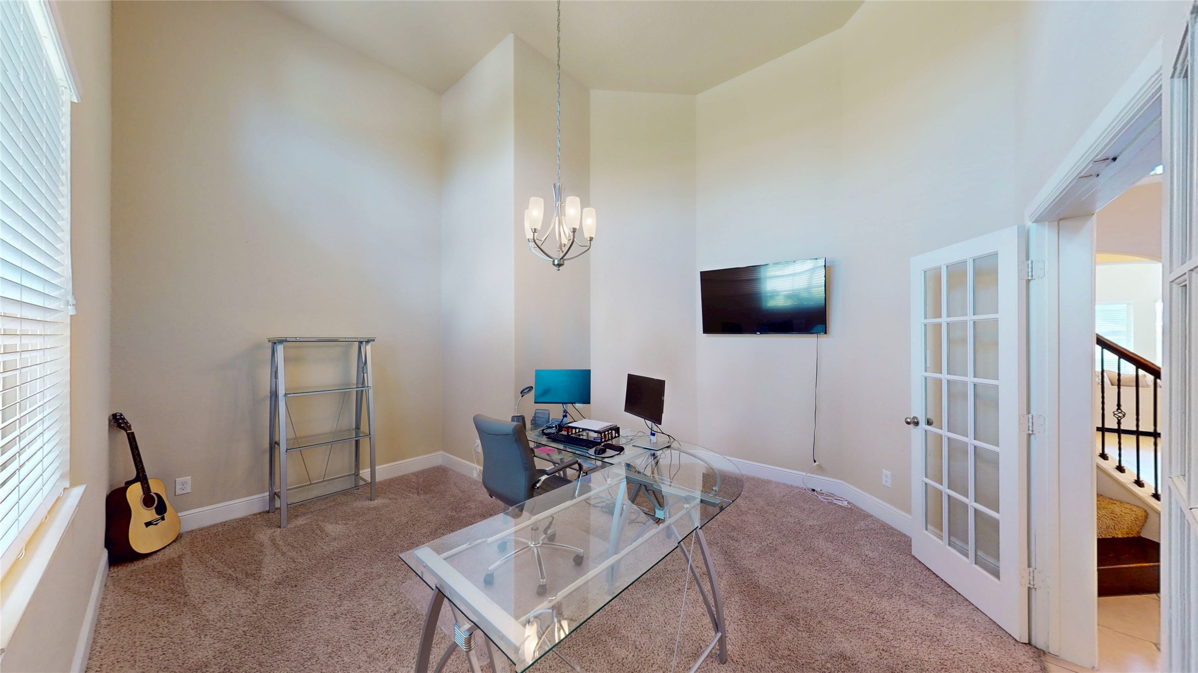 14535 Julie Meadows Lane Humble, TX 77396 - Photo 4 of 35 a living room with furniture a flat screen tv and a window