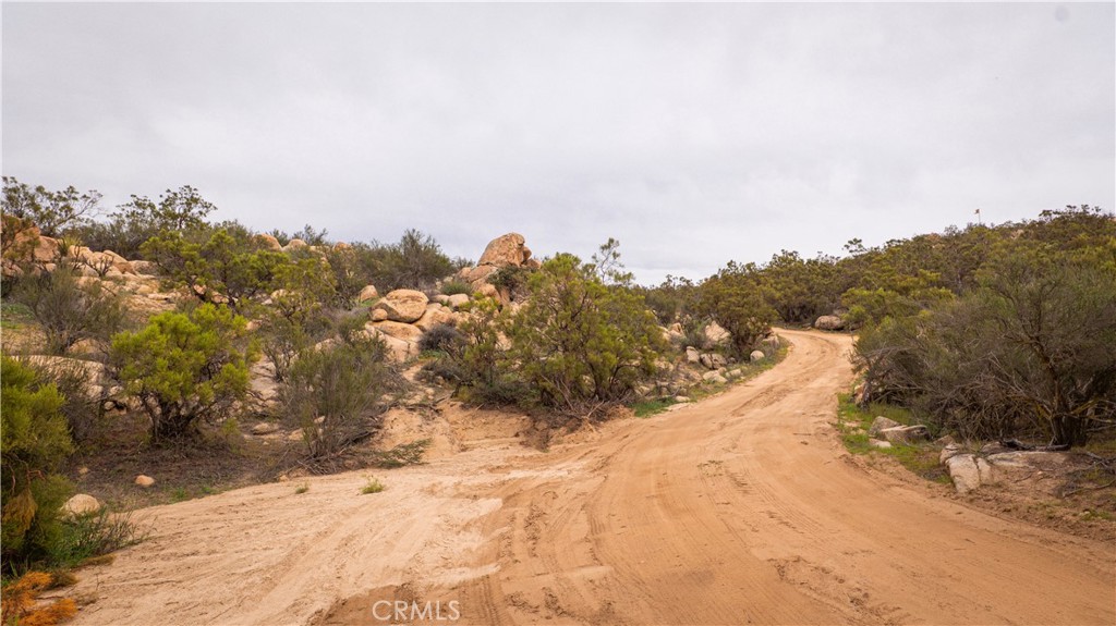 0 Aguanga Ranchos Road Aguanga, CA 92536 - Photo 4 of 25 a view of a road with trees in the background