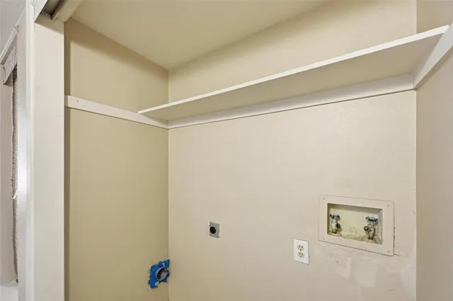 a bathroom with a shower and a shower