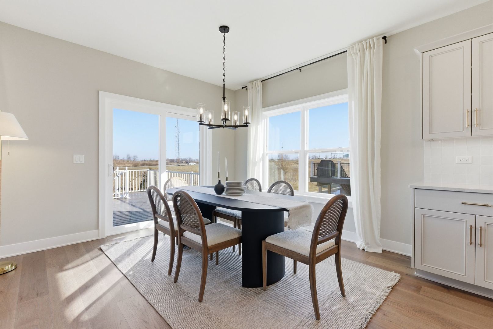 16541 Kayla Drive Lemont, IL 60439 - Photo 17 of 33 a view of a dining room with furniture window and wooden floor