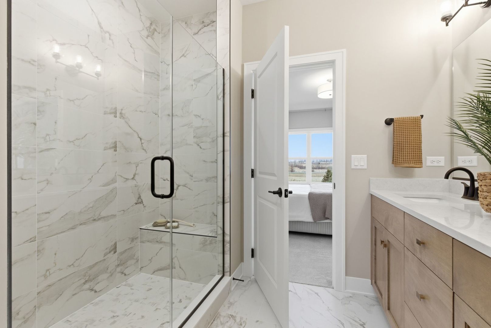 16541 Kayla Drive Lemont, IL 60439 - Photo 25 of 33 a bathroom with a granite countertop sink a toilet and shower