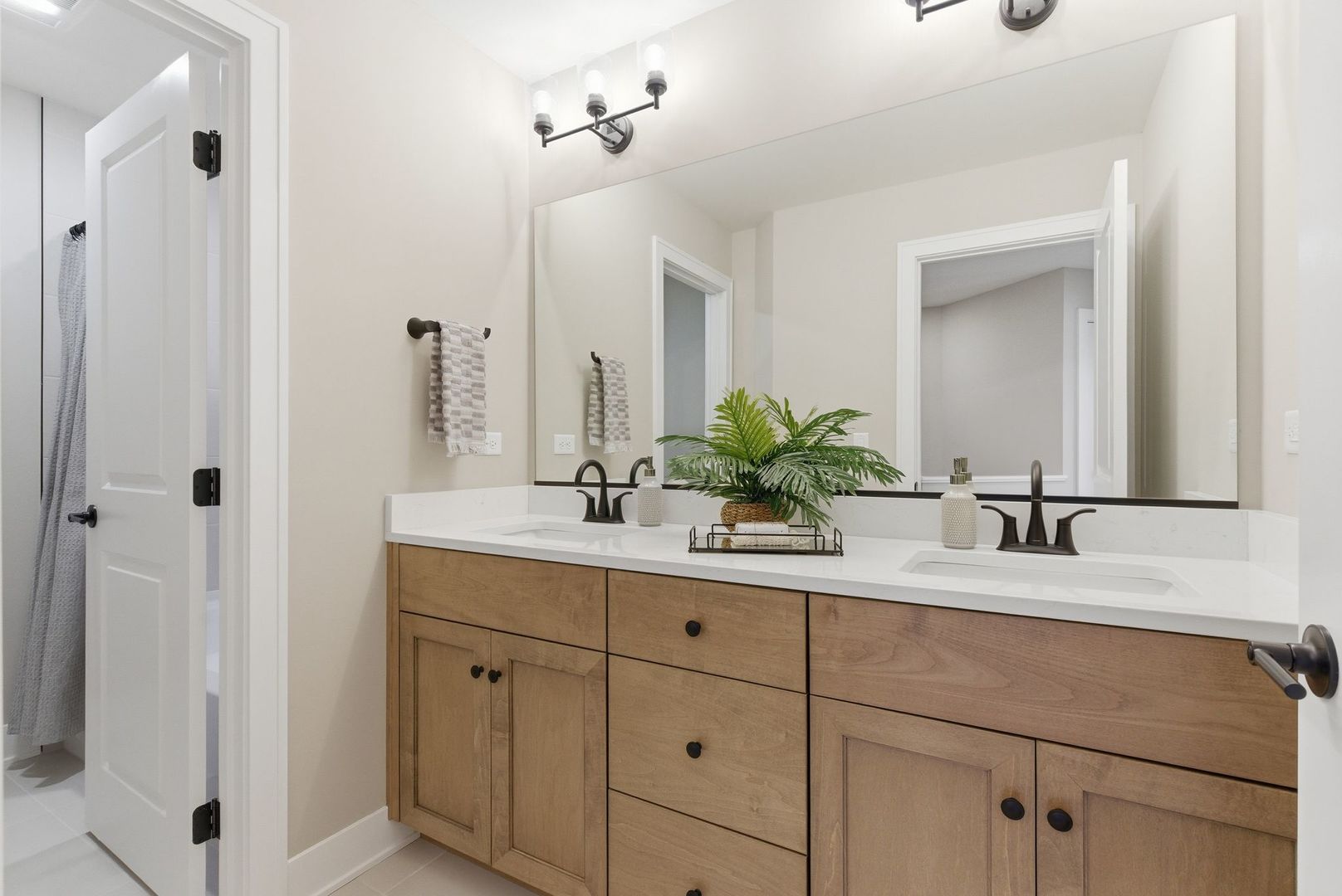16541 Kayla Drive Lemont, IL 60439 - Photo 27 of 33 a bathroom with a sink and a mirror