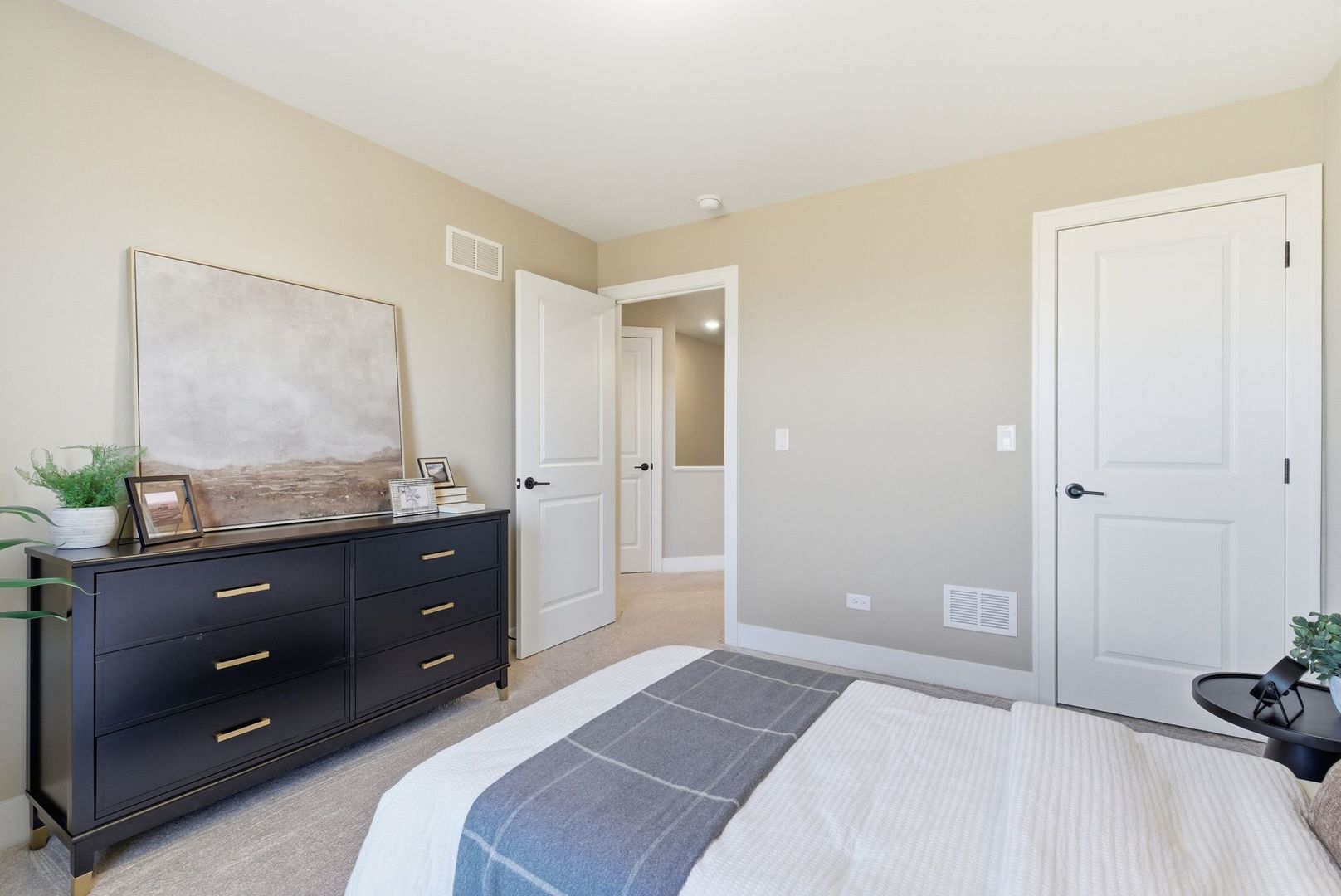 16541 Kayla Drive Lemont, IL 60439 - Photo 30 of 33 a bedroom with a bed and a dresser