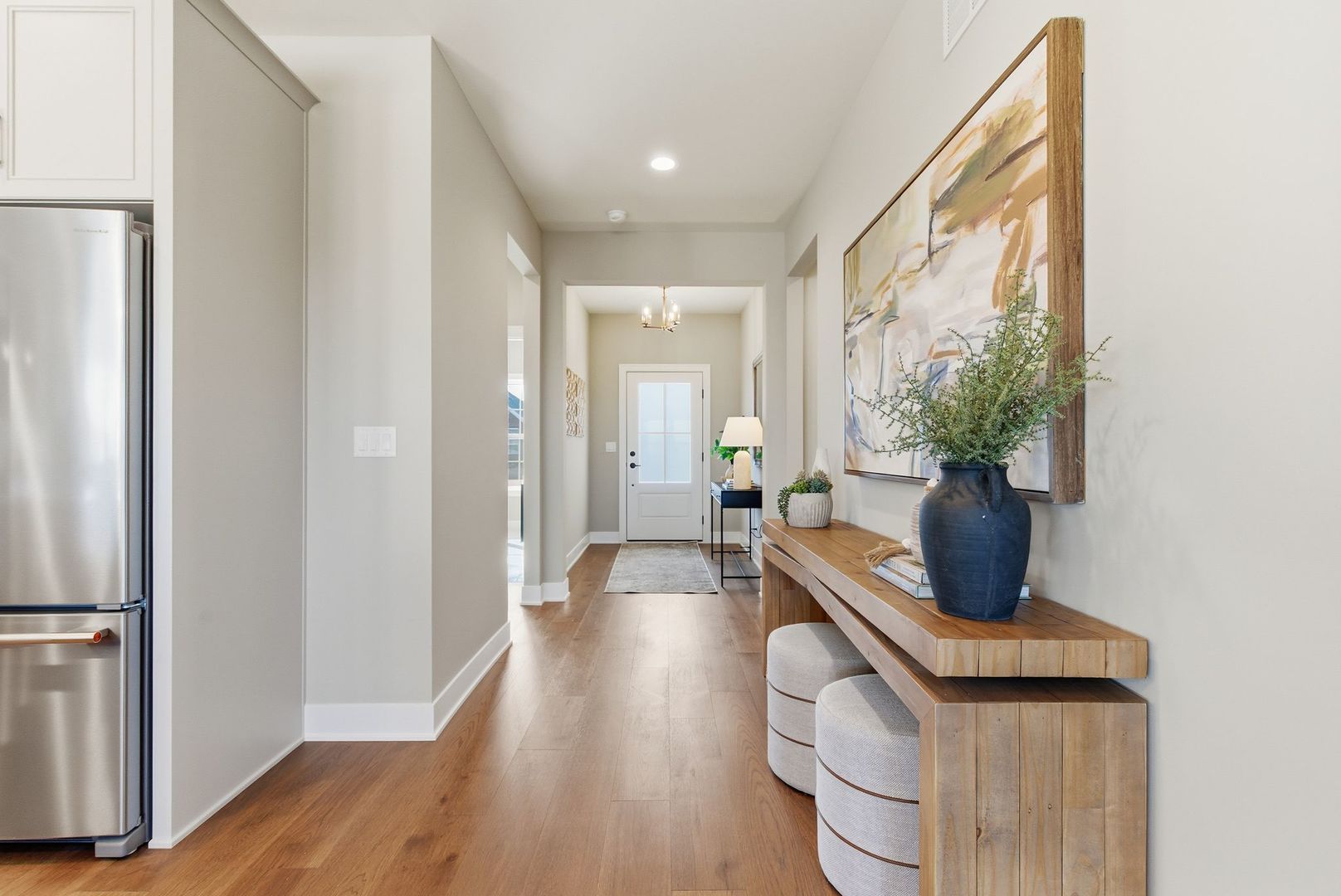 16541 Kayla Drive Lemont, IL 60439 - Photo 9 of 33 a living room with furniture and a potted plant