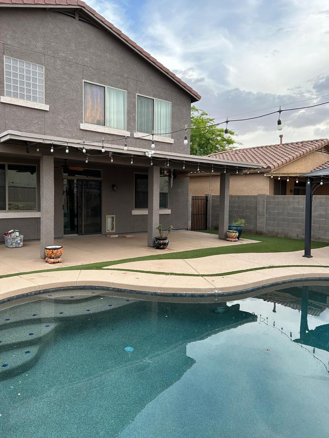 7044 West Alta Vista Road Laveen, AZ 85339 - Photo 11 of 11 a swimming pool view with a outdoor seating