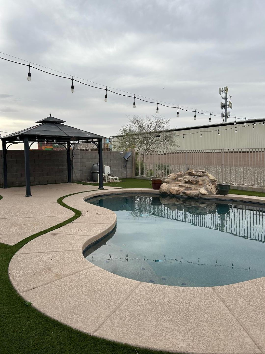 7044 West Alta Vista Road Laveen, AZ 85339 - Photo 10 of 11 a view of a swimming pool