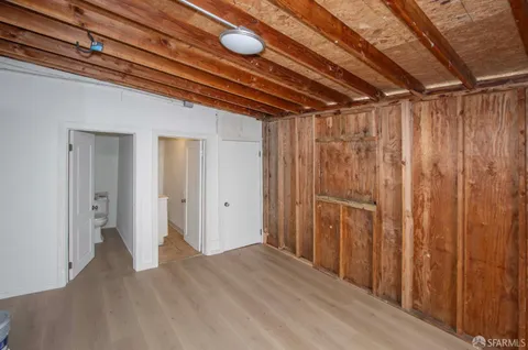 a view of room with wooden walls