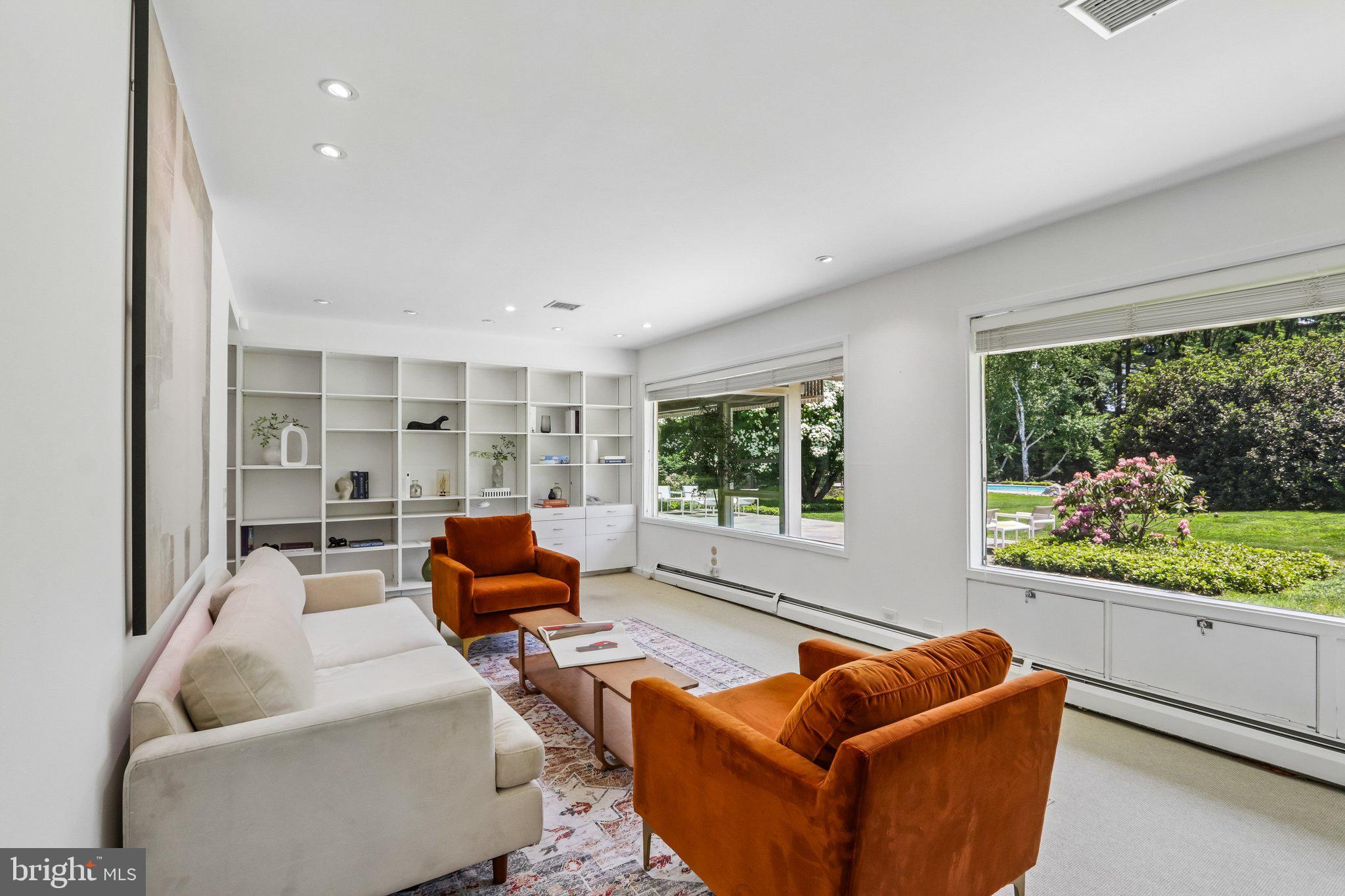 1673 Paper Mill Road Jenkintown, PA 19046 - Photo 29 of 73 a living room with furniture and a large window