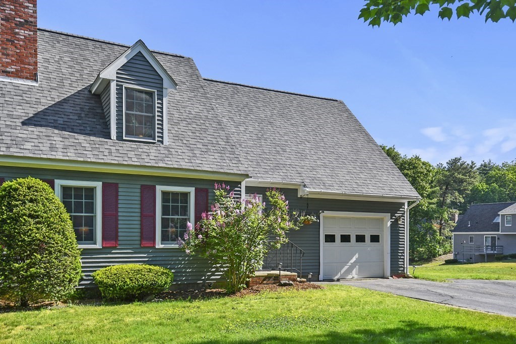 60 Peabody Road, Unit B Shirley, MA 01464 - Photo 1 of 42 a front view of a house with a yard