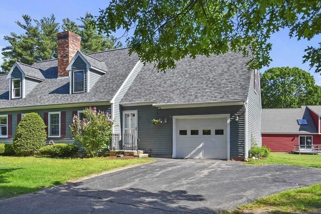 60 Peabody Road, Unit B Shirley, MA 01464 - Photo 2 of 42 a front view of a house with garden