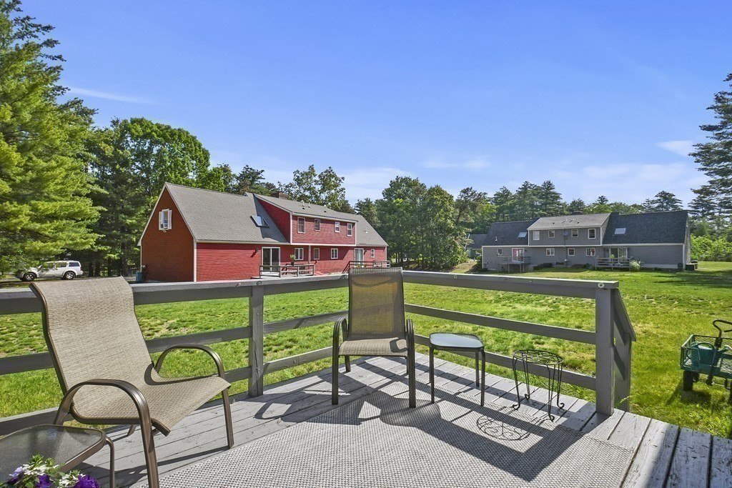 60 Peabody Road, Unit B Shirley, MA 01464 - Photo 29 of 42 a view of a chairs and table in the garden