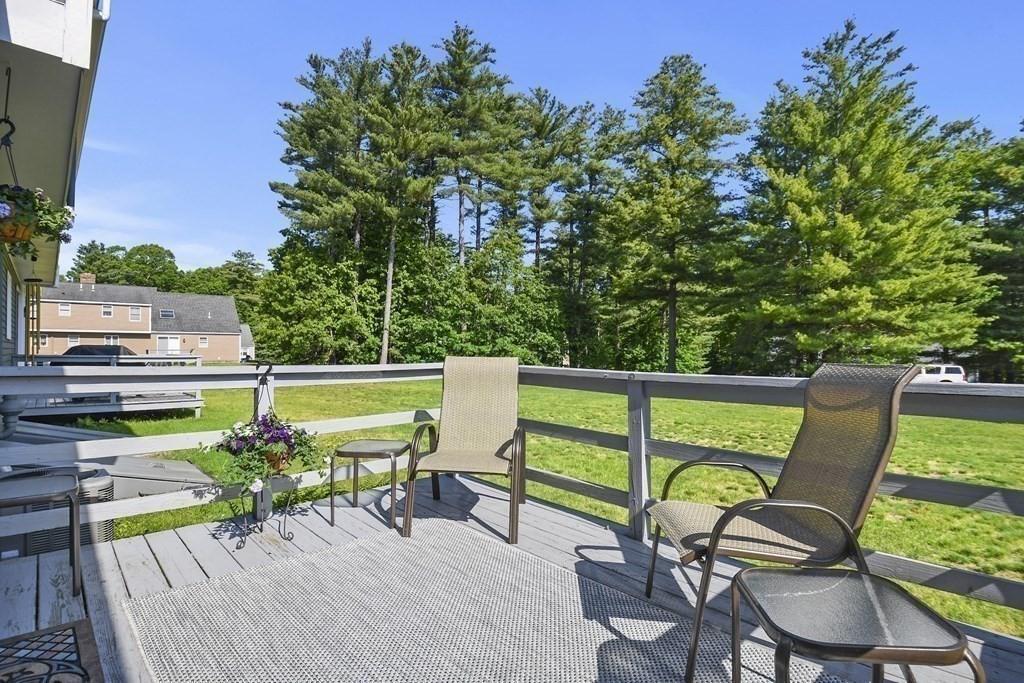 60 Peabody Road, Unit B Shirley, MA 01464 - Photo 30 of 42 a view of a chairs and table in patio