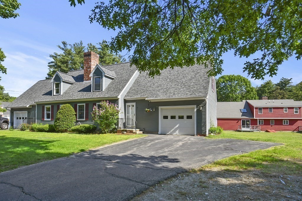 60 Peabody Road, Unit B Shirley, MA 01464 - Photo 3 of 42 a front view of a house with garden