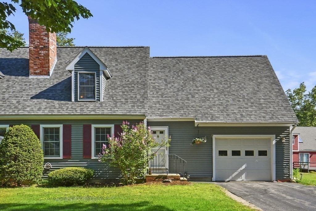 60 Peabody Road, Unit B Shirley, MA 01464 - Photo 38 of 42 front view of a house with a yard
