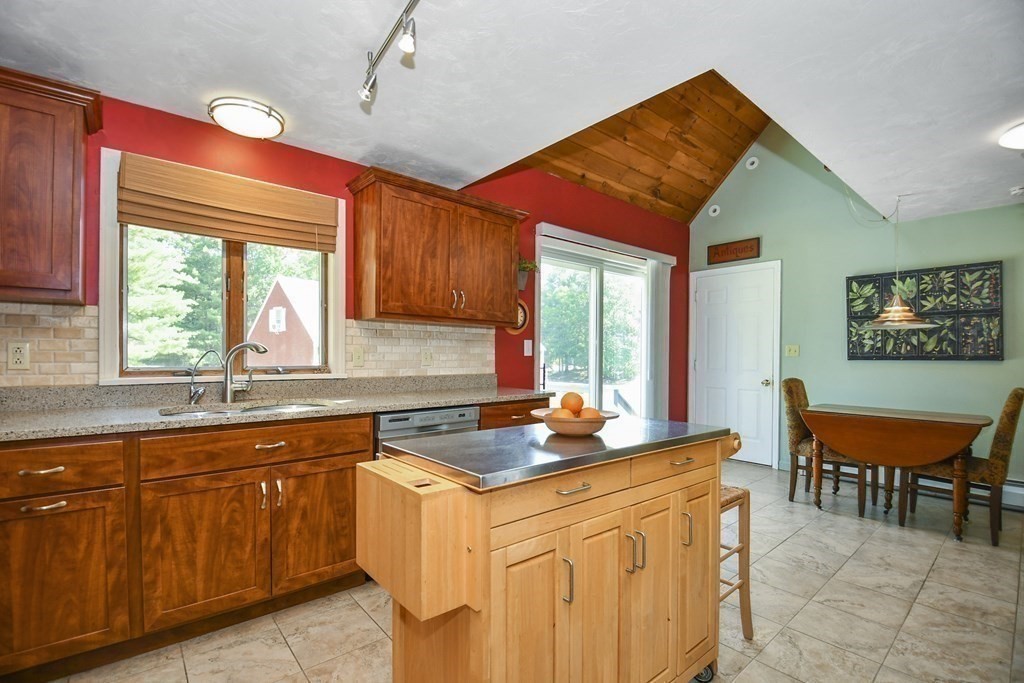 60 Peabody Road, Unit B Shirley, MA 01464 - Photo 6 of 42 a view of a kitchen area with furniture and window