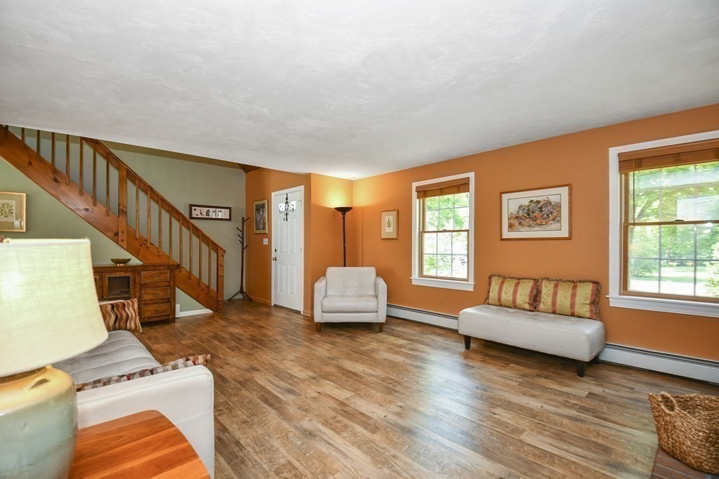 60 Peabody Road, Unit B Shirley, MA 01464 - Photo 10 of 42 a living room with furniture and a large window