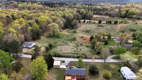 an aerial view of residential house with outdoor space