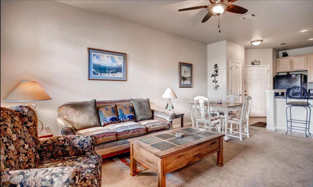 156 Village Road, Unit D102 Granby, CO 80446 - Photo 1 of 24 Living Room & Kitchen