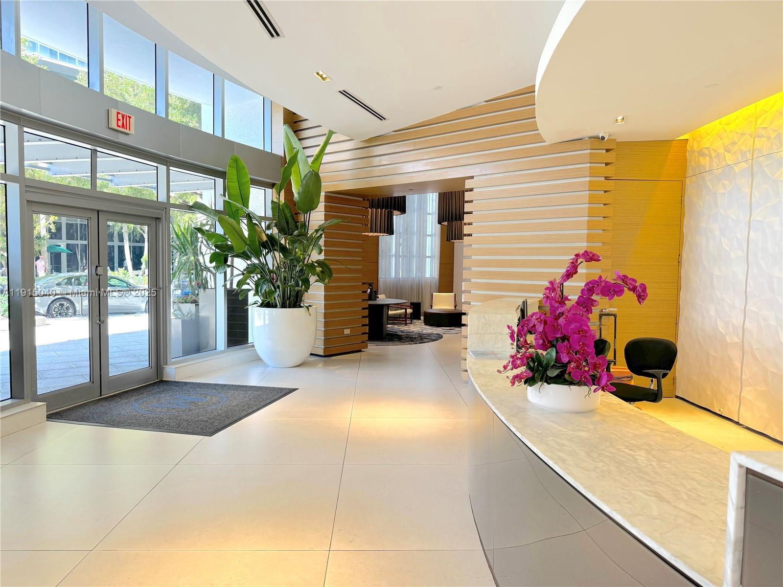 3301 Northeast 1st Avenue, Unit H3001 Miami, FL 33137 - Photo 2 of 53 a view of living room with a potted plant