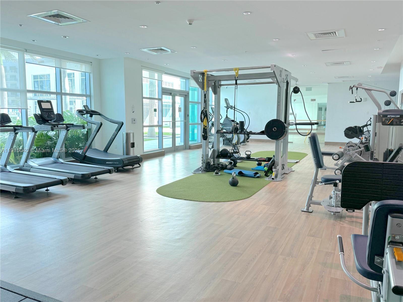 3301 Northeast 1st Avenue, Unit H3001 Miami, FL 33137 - Photo 51 of 53 a view of a room with gym equipment